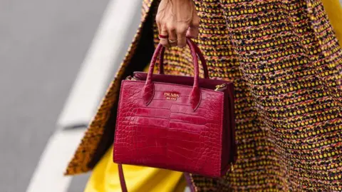 Prada to buy rival fashion brand Versace for $1.36bn
